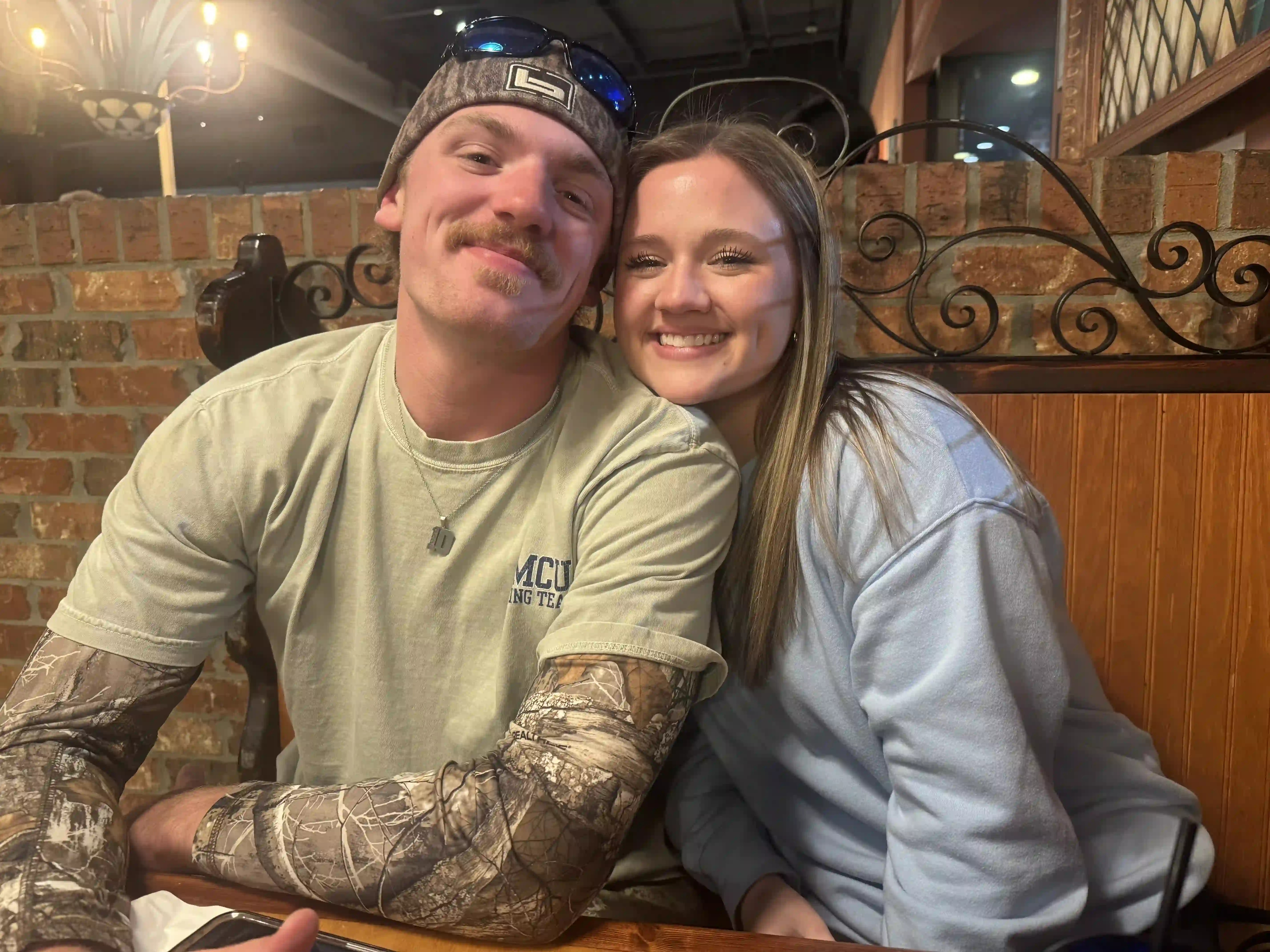 One of the families behind Ark Roofing and Gutters, a young couple out for dinner